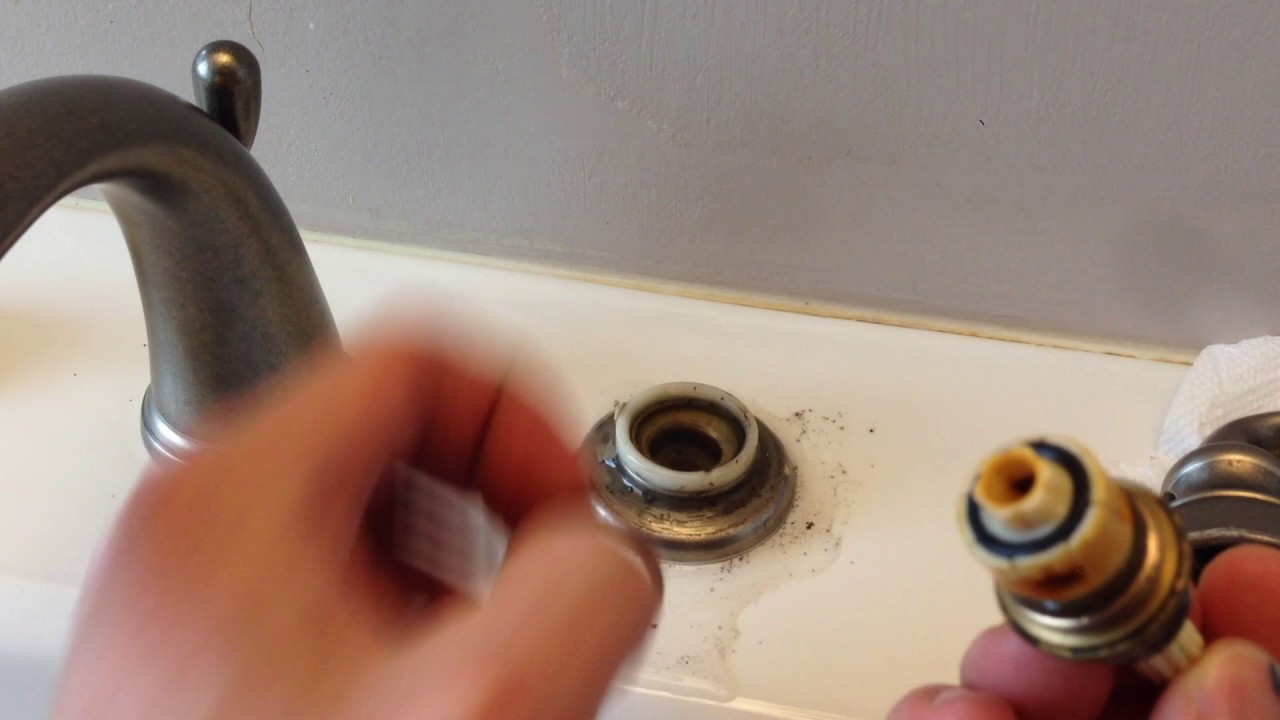 old two-handle bathroom sink faucet repair