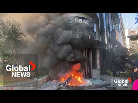 Protesters in Lebanon set fire to banks over restrictions on cash withdrawals