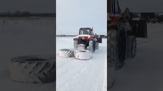 Помчался МТЗ, чистя снег.