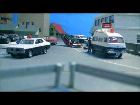 疾走の追跡(Perseguição de carro em miniatura)