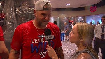 Alex Chappell talks with Matt Adams after Nats clinch