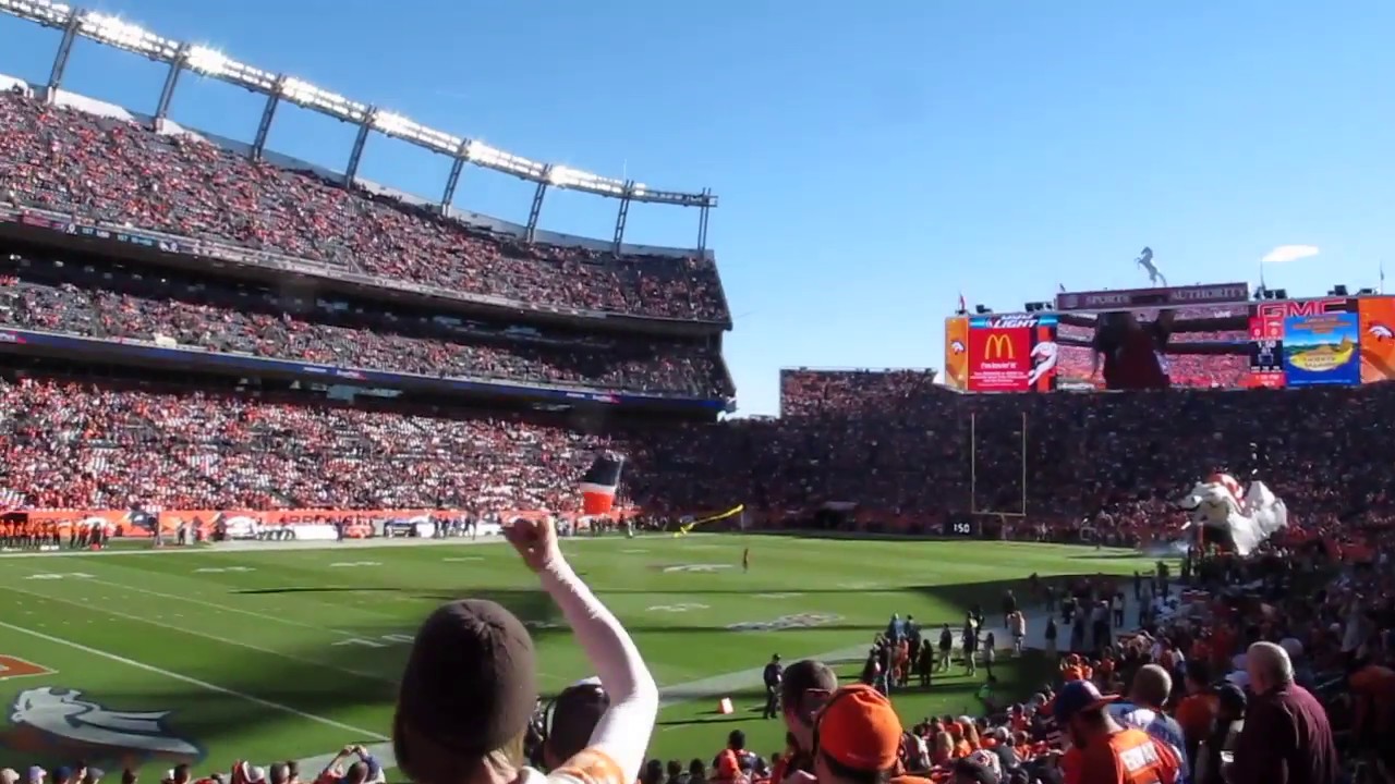 The Thunderstorm parachute team skydiving into Denver Broncos stadium