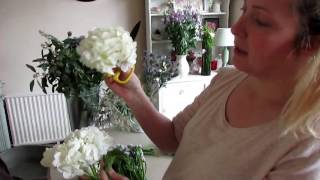 Making the Bridal bouquet, button holes and head table arrangement Making the Bridal bouquet, button holes and head table arrangement