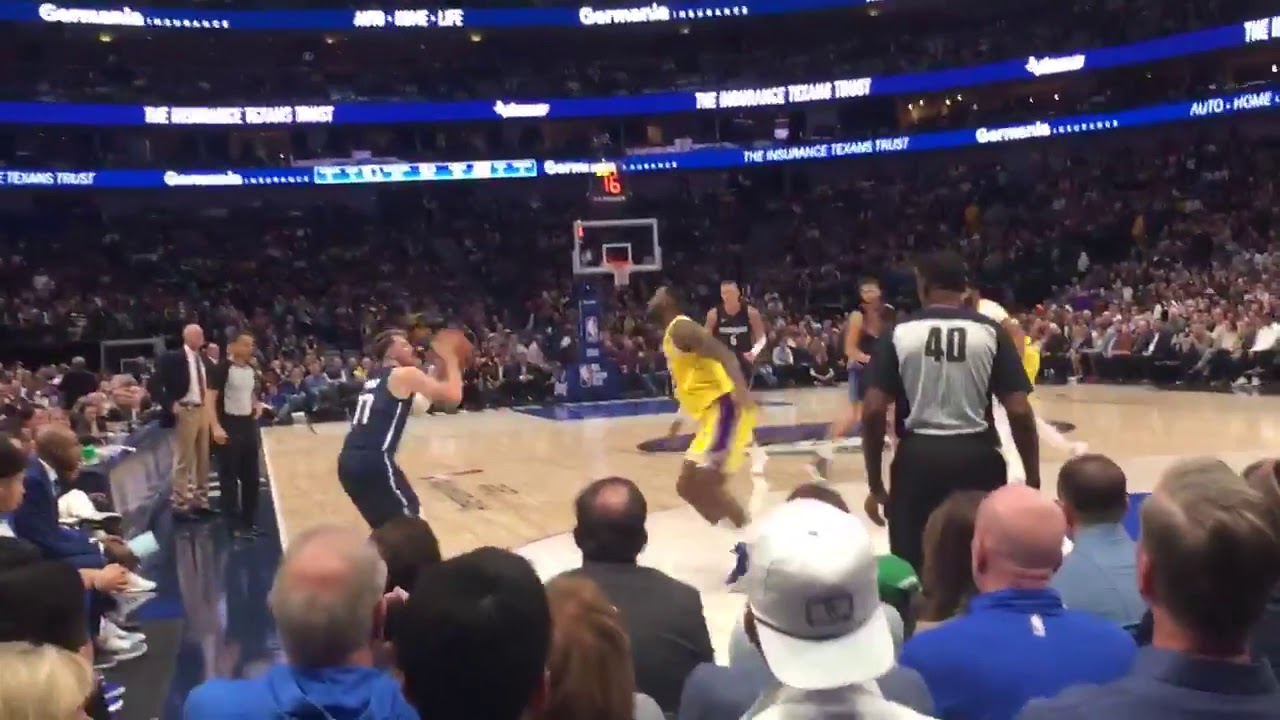 Courtside angle of Luka Doncic crossing up Lebron and knocking down ...