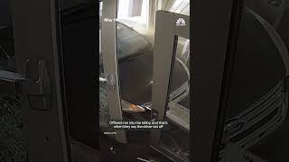 Footage captures a man crashing his car into an Alaskan police station
