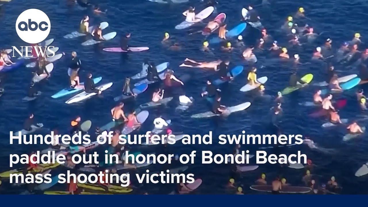 Hundreds of surfers and swimmers paddle out in honor of Bondi Beach mass shooting victims