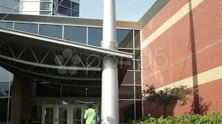 Student Walking On College Campus Stock Footage