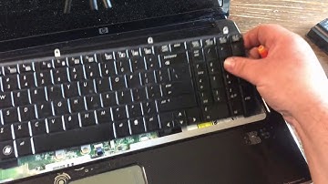 How to remove and install a keyboard in a HP Pavilion DV7 laptop