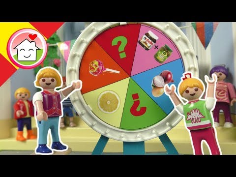 Playmobil en español Fiesta de inauguración con la ruleta de la fortuna - La Familia Hauser