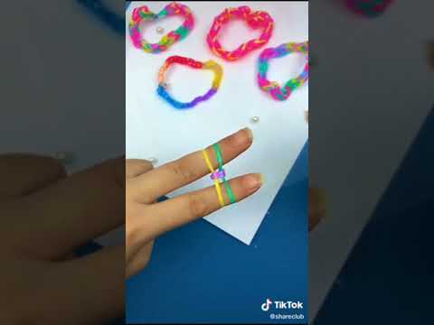 Video: Cómo hacer una pulsera de tenedor: 10 pasos (con imágenes)