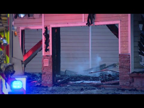 Omaha fire crews battle fire as flames engulf an Elkhorn home - YouTube