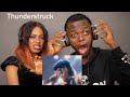 OUR FIRST TIME HEARING AC/DC - Thunderstruck (Official Video) REACTION!!!😱