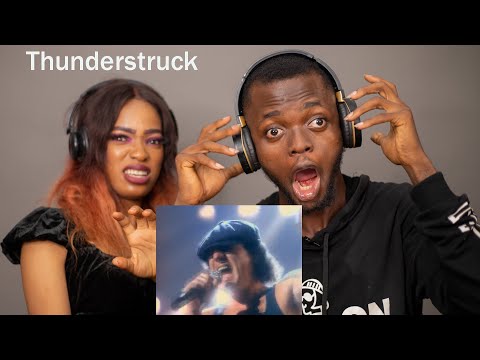 OUR FIRST TIME HEARING AC/DC - Thunderstruck (Official Video) REACTION!!!😱