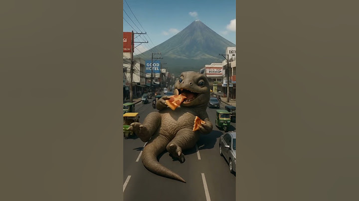Cutest Dino Ever Eats Pizza with a View! 🦖🍕🌋#dinosaur  #dino   #shorts