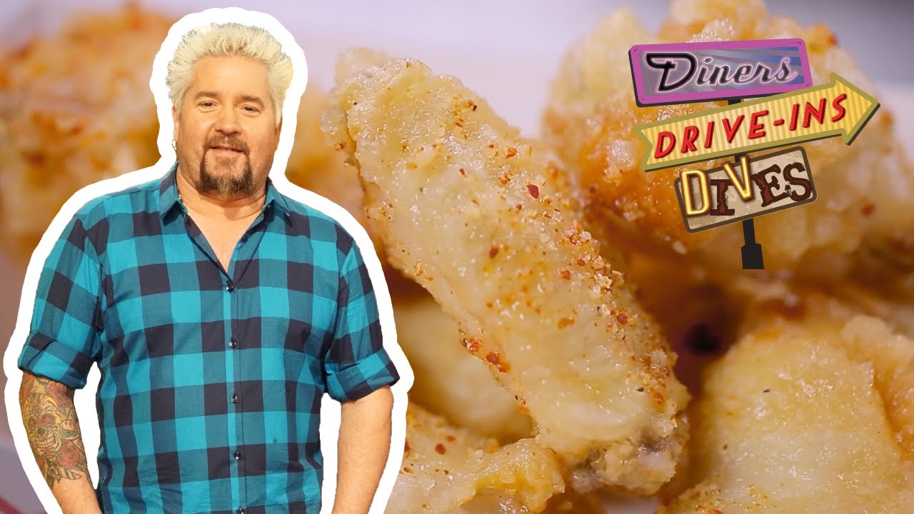 Guy Fieri Eats Szechuan Parmesan-Garlic Wings | Diners, Drive-Ins and Dives | Food Network
