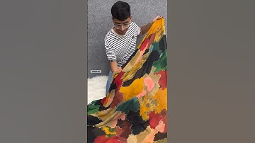 Witness the process behind our Chiffon Sabyasachi printed saree with a delicate sequence lace border