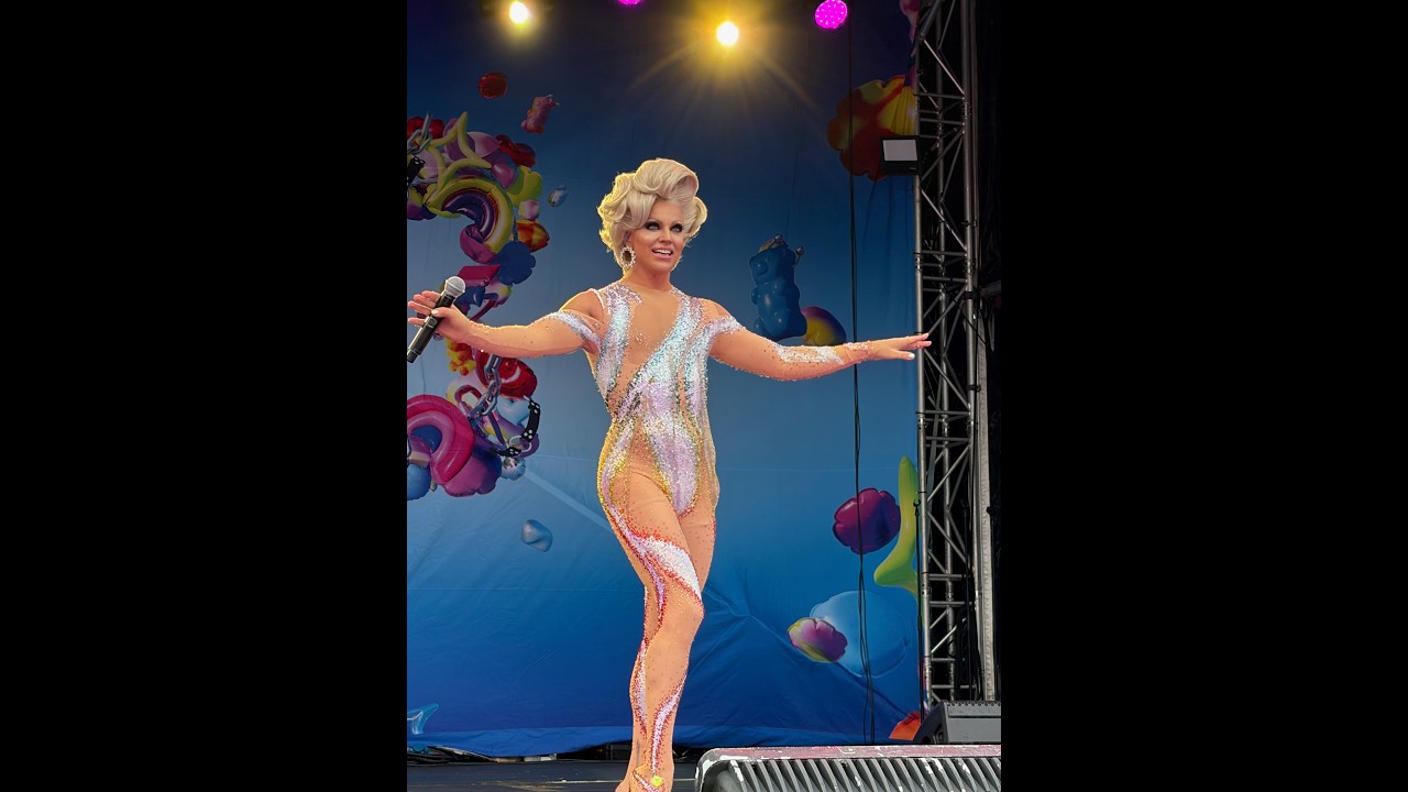 Courtney Act sings cabaret medley of Lady Gaga, Kylie Minogue and Madonna at Fair Day 2026.