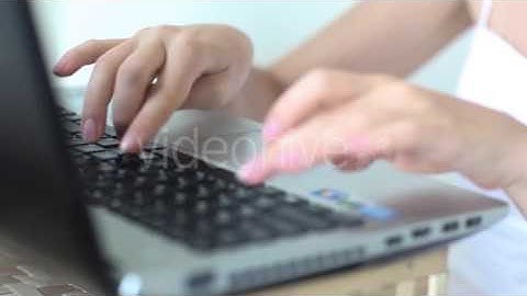 Woman Hands Typing Text Scrolling Laptop Computer Office, at Home Inside, Close-Up, Blurred