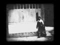 Man walking around a corner 1887