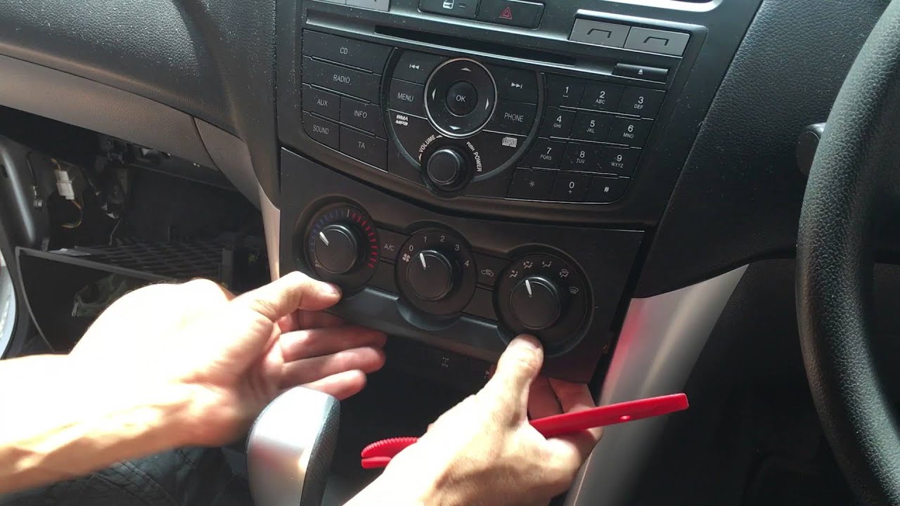 Мазда 6 снятие магнитолы