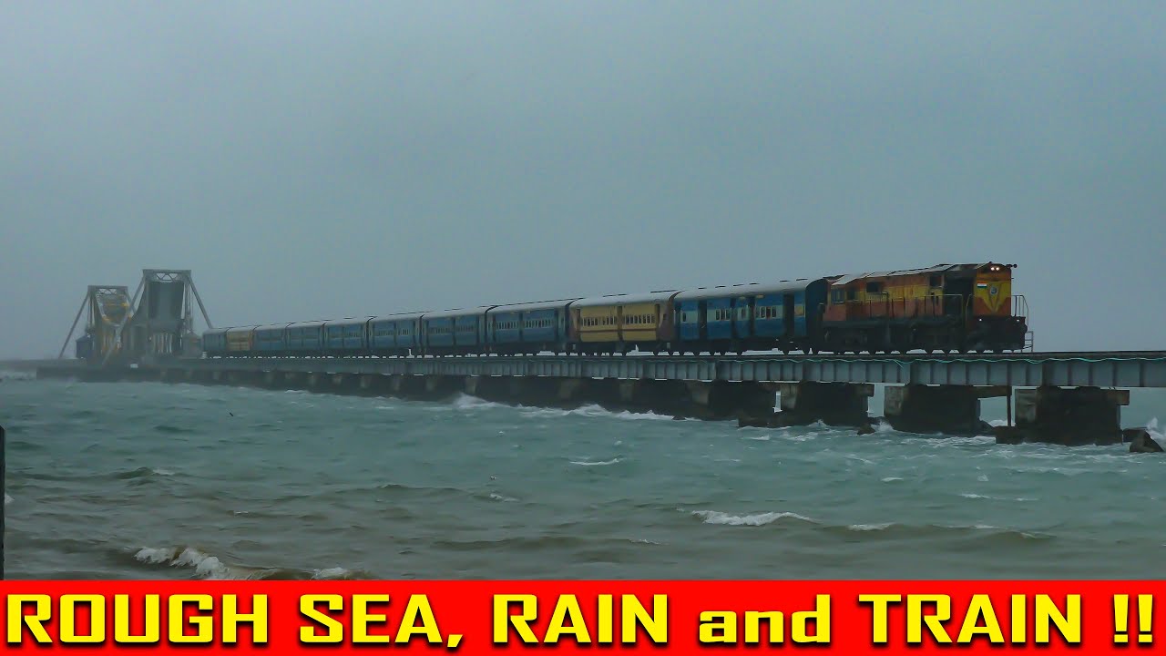 ROUGH SEA, RAIN and TRAIN !! ORANGE ALCo crosses the PAMBAN BRIDGE | Indian Railways