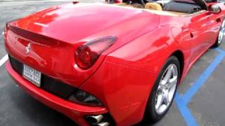 A red ferrari california converting its hardtop. very cool site. thank
you newport ferrari. happy birthday me. this was an awesome present.
yo 36 secon...