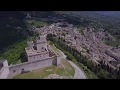 Flying drones over a medieval castle in Assisi Italy