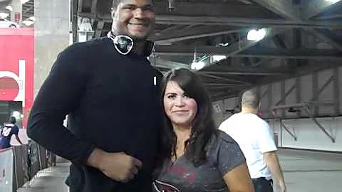 Renee Romo meeting Calais Campbell from the Arizon...