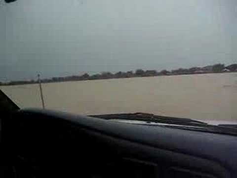 Driving through a river to reach Gorom Gorom, Burkina Faso