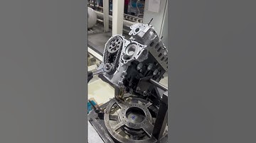 Timing chains are installed on the engine factory production line. What kind of engine is this?