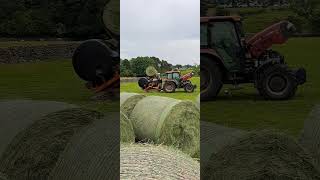 Wrapping and stacking big bales haylage 17th June 2023