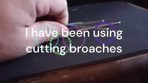 Talking about installing bushings in a clock using both cutting broaches/reamers. Using KWM reamers