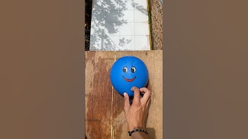 Experiment: Dropping colorful emoji water balloons from a height