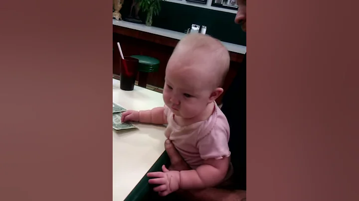 My niece, Marlena, grabbing money at NY Lunch3