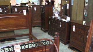 Casual Cherry bedroom furniture group in the Colonial Furniture Factory Outlet, Freeburg PA.