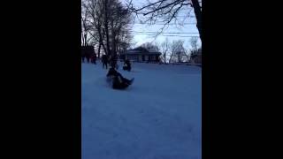 Trash bag sled jumping