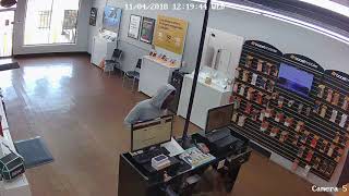 Surveillance Video: Boost Mobile Theft Suspect