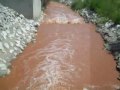 Big Goose Creek runs red