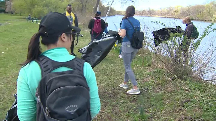 Earth Day volunteers helping clean up Charles River shoreline