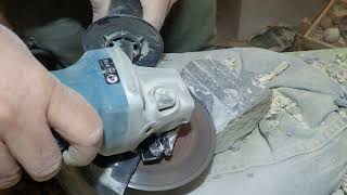 Grinding calcit ammonite with an angle grinder