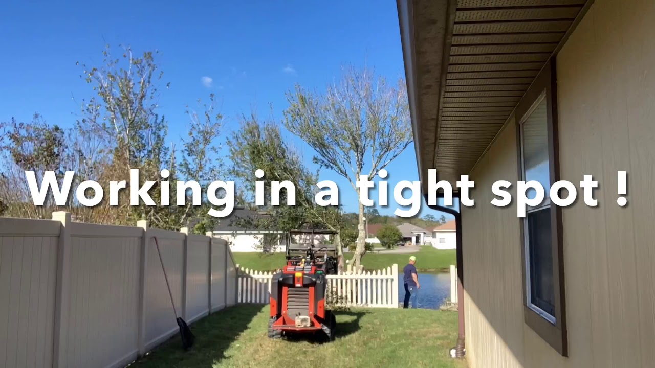 TREE LIFE HAS A SMALL TREE REMOVAL IN A BACK YEAR OVER A FENCE BY A ...
