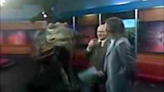 Baby T-Rex Attacks KAKE News Anchor Mike Iuen