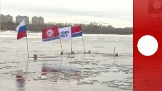 Fire And Ice Olympic Torch Takes A Bath In Russias River Amur