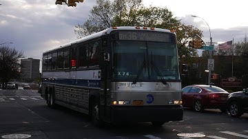 MTA Bus Company:Lake Success N. Shore Towers Bound 2002 MCI D4500 #2910 QM36 @Union Turnpike/Main St