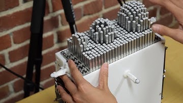 shapeShift: A Mobile Tabletop Shape Display for Tangible and Haptic Interaction