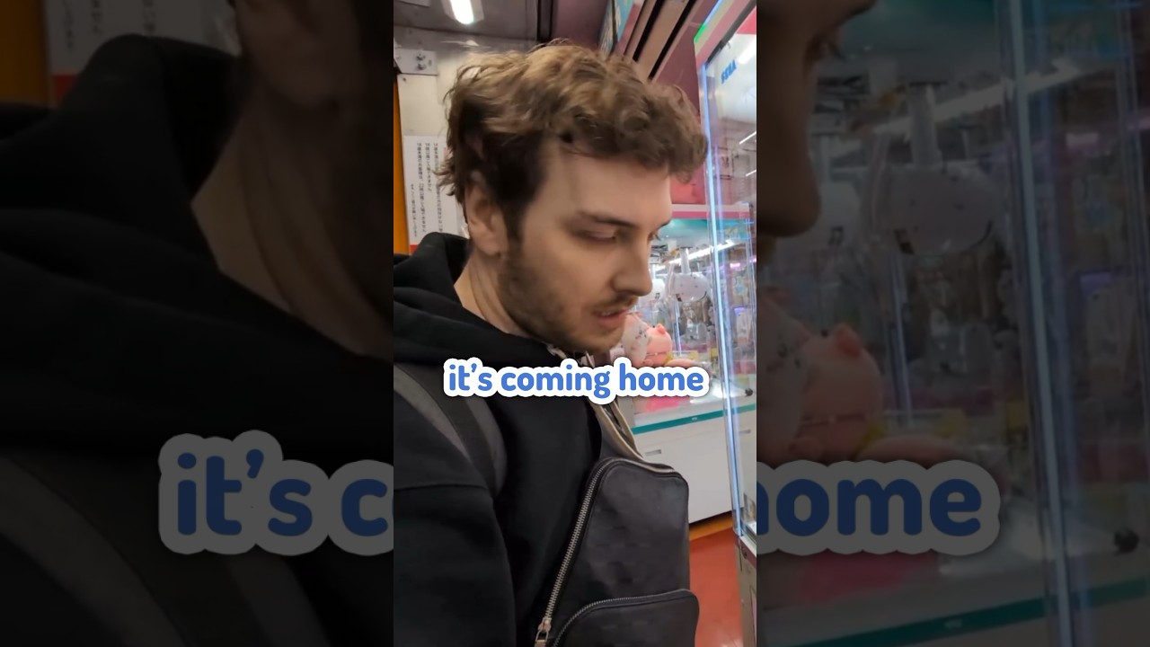 Rainhoe and CDawgVa playing Crane Games in Japan