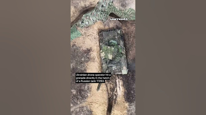 Ukrainian drone operator hit a grenade directly in the hatch of a Russian tank T72B3 #warinukraine