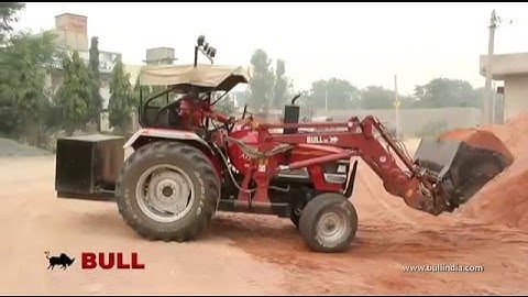 BULL  v2 loader with booster bucket on Mahindra arjun handling building materials