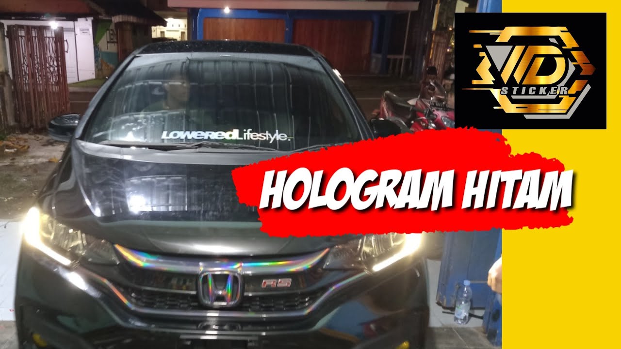 PASANG STIKER HOLOGRAM HITAM DI GRILL MOBIL JAZZ