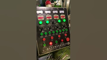 Flange Nut tapping machine.